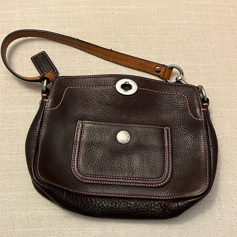 Small chestnut, brown leather coach handbag